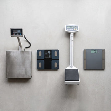 Professional gym scales including digital, body composition analyzer, and height-weight combo units
